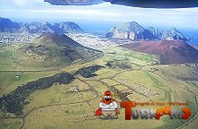 220px-Eldfell_Helgafell_and_the_fissure.jpg