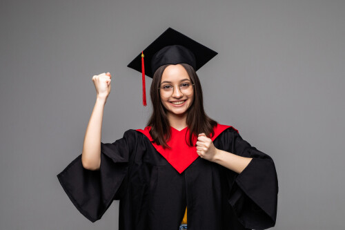 woman-graduate-student-wearing-graduation-hat-gown-isolated-white-scaled.jpg