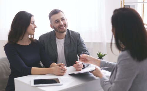 young-family-listening-to-financial-advisor-ready-to-sign-credit-contract.jpg