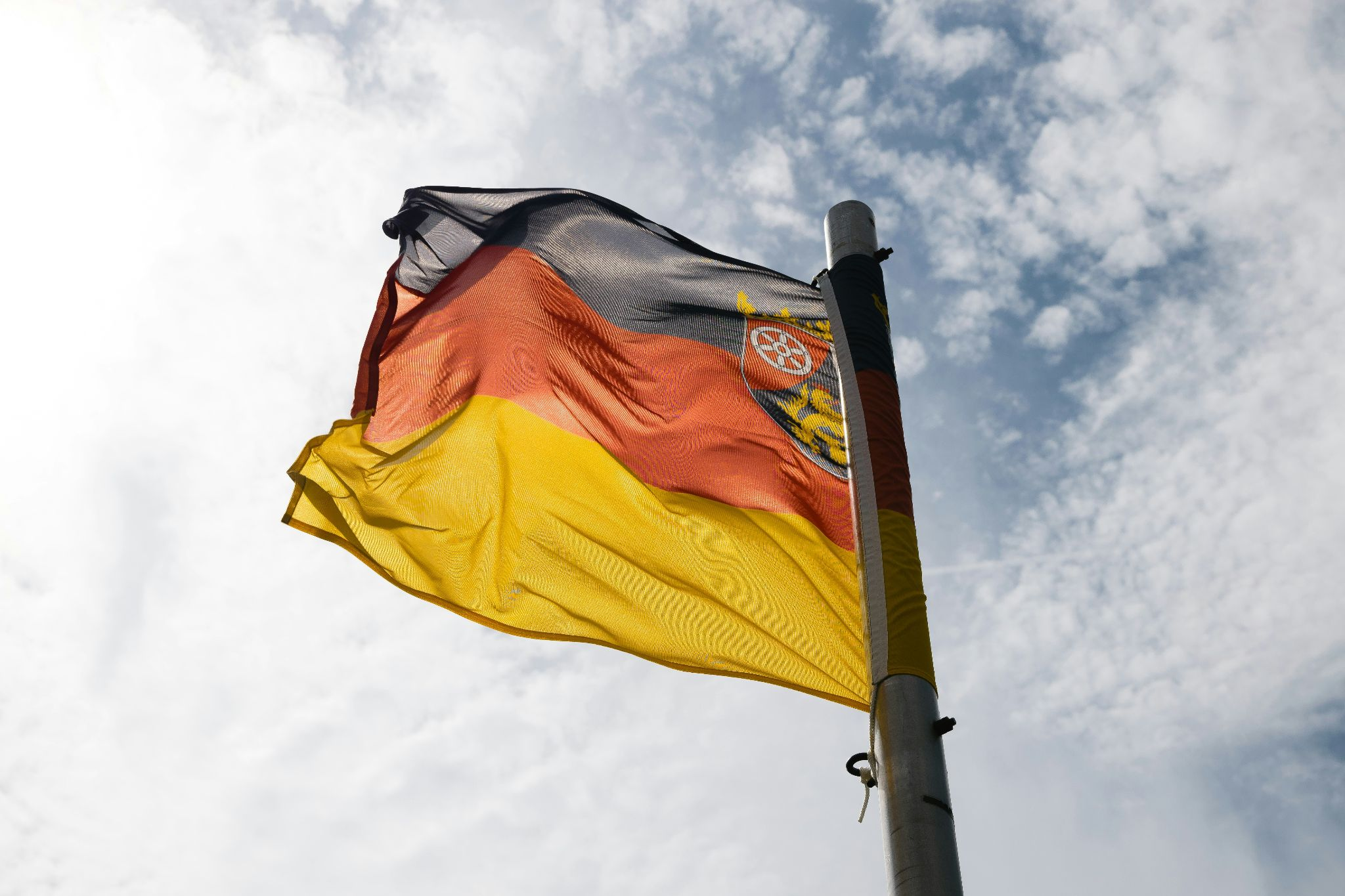 How to Enhance A Building with Expert Window Installation and Unique Custom Flag Poles?